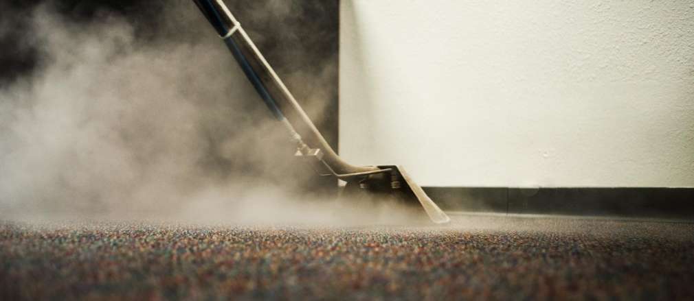 Steam cleaning a carpet